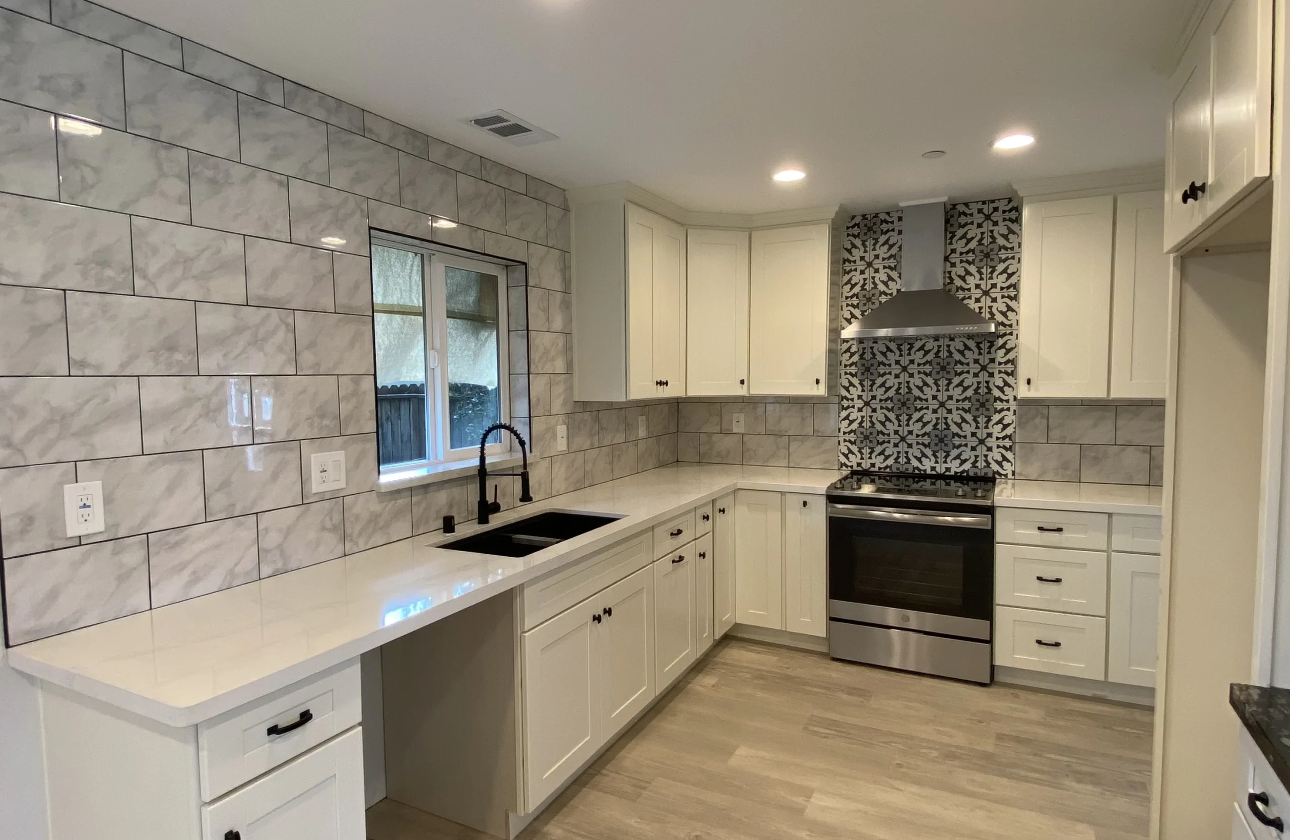 Kitchen remodeler Santa Clara completed open plan renovation with hardwood floors and modern kitchen by Dreamprint Home Remodeling